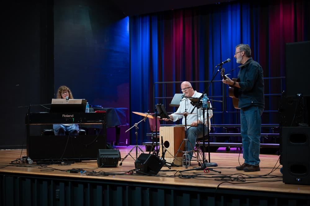  Whitney Road performing in front of students and staff at Pulaski Middle-Senior High School.